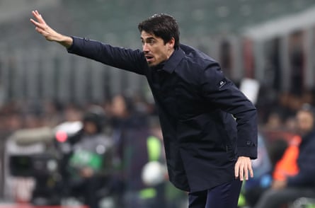 Carlos Cuesta gives instructions on the touchline.