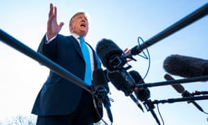 Donald Trump speaks to the media outside the White House.