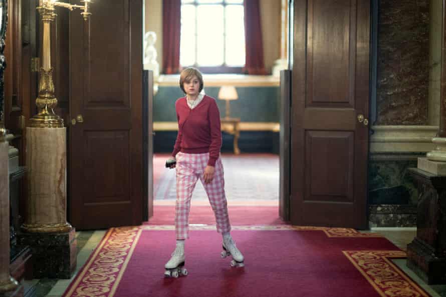 Emma Corrin as Princess Diana roller-skates through the Buckingham Palace state rooms in The Crown.