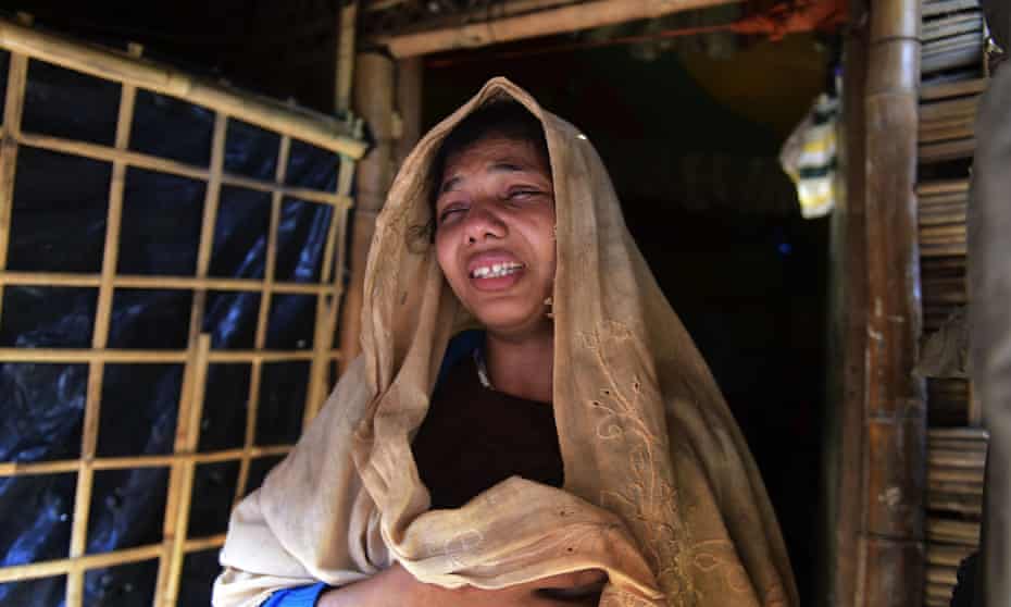 Rohingya refugee Nur Begum after the death of her six-month-old son Alam in a refugee camp in Teknaf, in Bangladesh, on 26 November