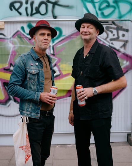 Fabian and Mattias from Sweden posing with cans of the ubiquitous Red Stripe