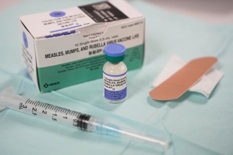 A dose of the measles vaccine with a syringe.