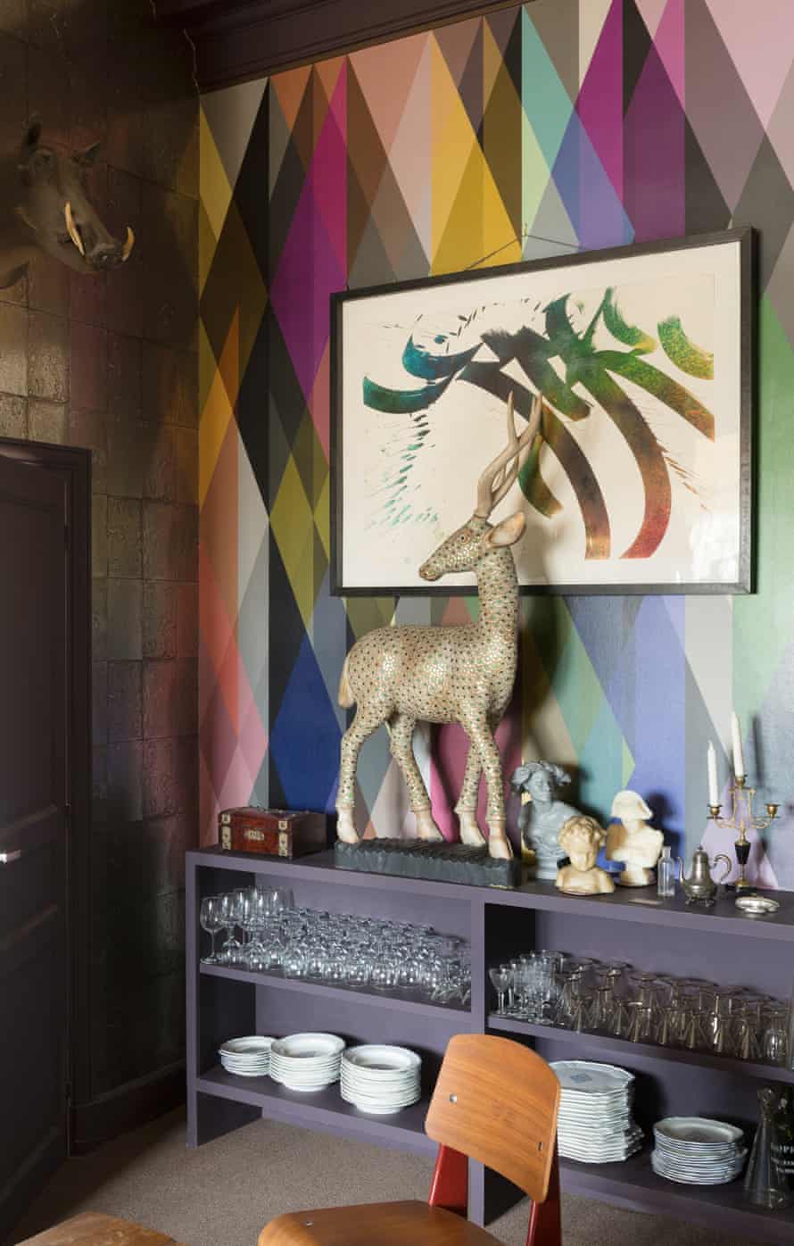 Cole & Son Geometric II Prism and Antique Mirror wallpapers in the dining room.