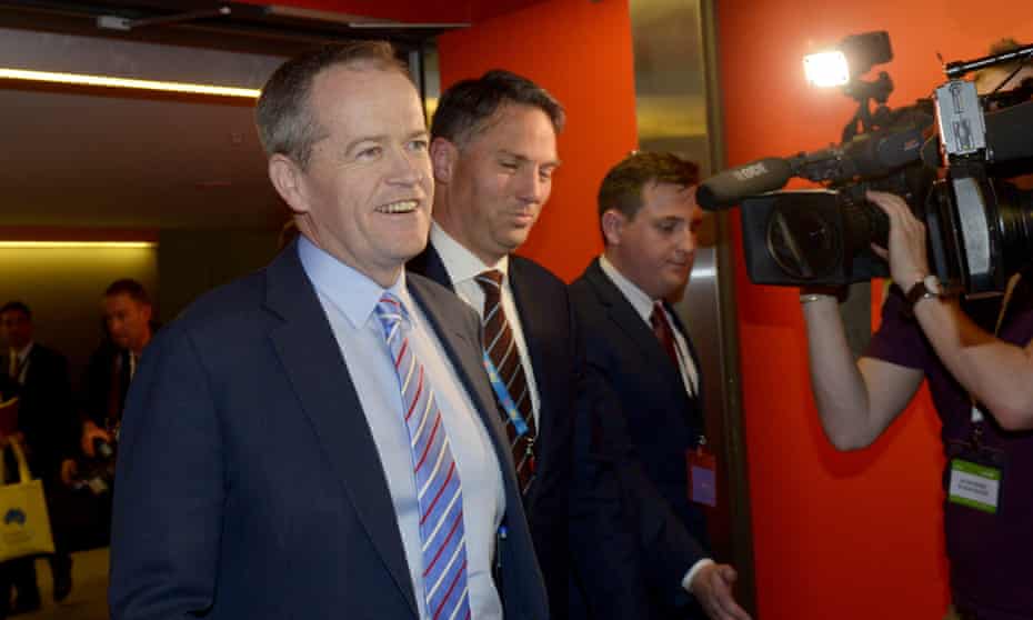 Bill Shorten and Labor immigration spokesman Richard Marles leave the conference after succeeding in the vote on asylum turnbacks.