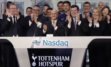 Daniel Levy, centre, and staff members of Tottenham, attend the opening bell at the Nasdaq MarketSite,  in New York