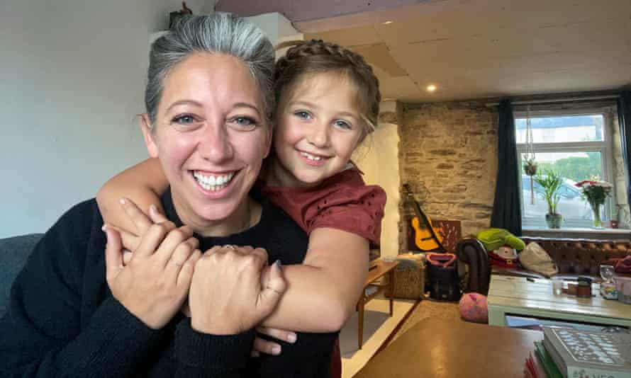 Surf, scones… but no homes: the battle for the soul of Cornwall | Cornwall 2 Jess Ratty with her daughter.