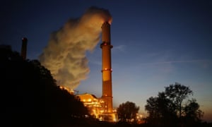 Emissions rise from the Northern Indiana Public Service Co. Bailly generating station. By promoting coal power, President Trump could try to alter the economics of pursuing low-carbon.