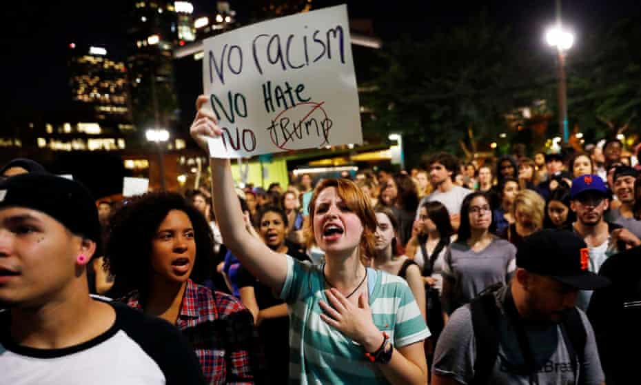 Demonstrators protest against the Trump victory outside city hall in downtown Los Angeles. 