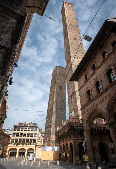 The Garisenda, left, and Asinelli towers in Bologna, Italy.