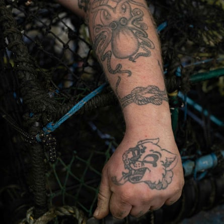 The tattooed arm of first mate George Lamplough