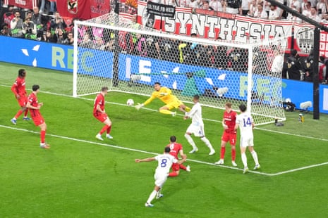 Youri Tielemans (centre) scores their side’s first goal of the game