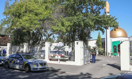 police vehicles parked outside Al Noor Mosque in Christchurch