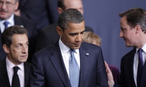 Barack Obama flanked by Nicolas Sarkozy and David Cameron