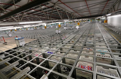 “Bots” are seen operating on Ocado’s “smart platform” at the its customer fulfilment centre in Andover.