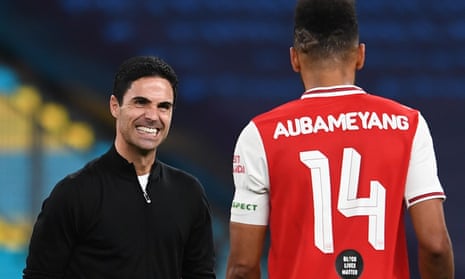 Arsenal’s manager, Mikel Arteta, congratulates the match winner Pierre-Emerick Aubameyang after the final whistle at Wembley.