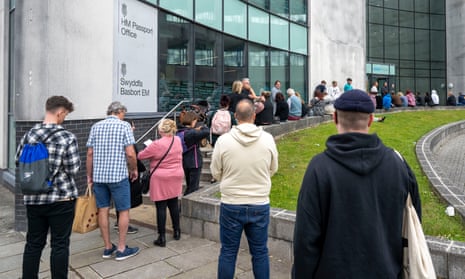 People queuing outside Newport Passport Office in Wales in May.