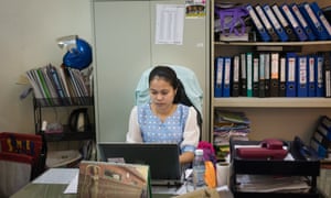 Chhan Sokunthea, head of the women and children’s division in her office at Adhoc