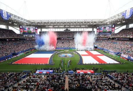 Fireworks explode after the national anthems.