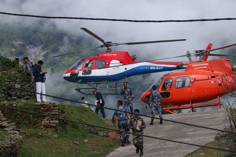 Rescue teams conduct search and rescue operations in flood-hit areas of Rasuwa, Nepal