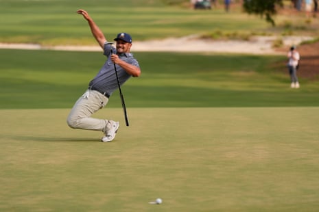 Bryson DeChambeau reacts after missing a putt on the 16th hole.