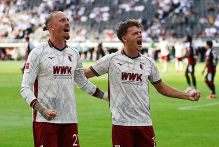 Augsburg’s Robin Fellhauer (right) celebrates his goal against Eintracht Frankfurt with team-mate Marius Wolf.