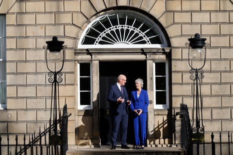 John Swinney, Scotland's first minister, welcoming the president of Ireland, Catherine Connolly to his official residence, Bute House, in Edinburgh today.
