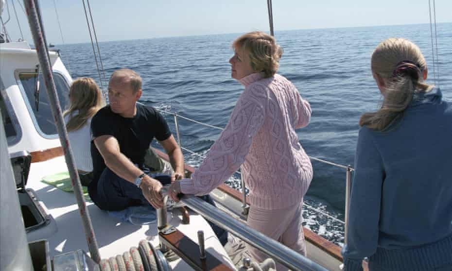 Putin with former wife and two daughters on boat