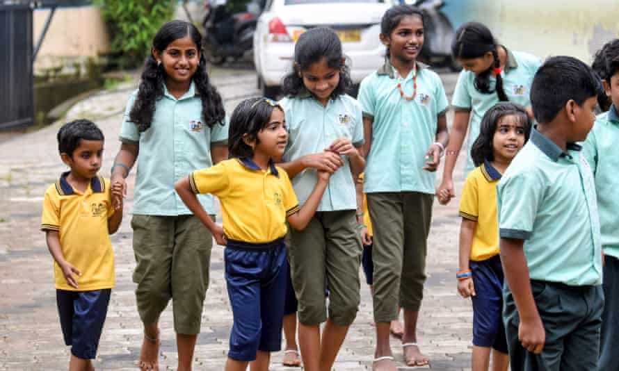 Valayanchirangara primary school students wearing gender neutral uniforms.