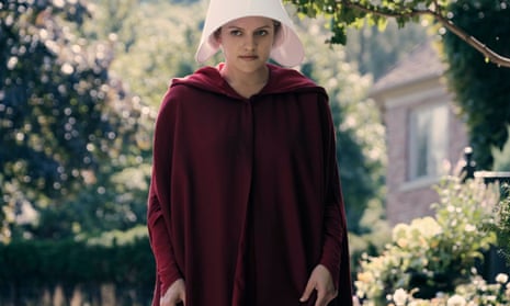 Offred, played by Elisabeth Moss, struggles to survive in The Handmaid’s Tale.