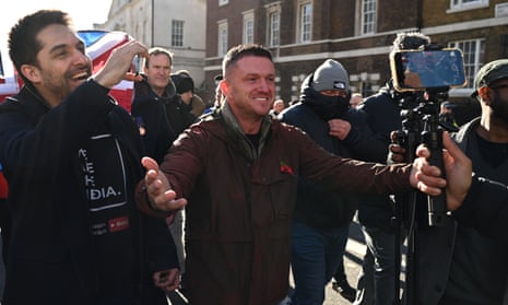 Tommy Robinson (centre), whose real name is Stephen Yaxley-Lennon.