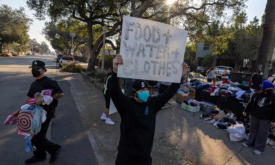 Local residents give away food, clothing, personal items and water to assist anyone affected by the Eaton Fire, on 10 January.