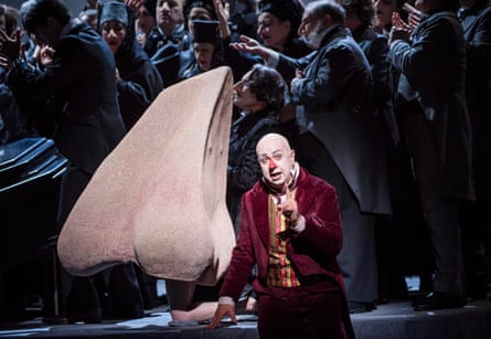 Martin Winkler, ‘breathless in a burgundy suit’ as Kovalov in The Nose.