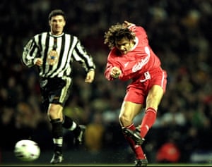 Patrik Berger of Liverpool shoots at goal as Gary Speed watches on.