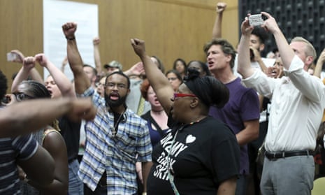 Protesters yell during the Charlottesville City Council meeting Monday, Aug. 21, 2017, in Charlottesville. Anger boiled over at the first Charlottesville City Council meeting since a white nationalist rally in the city descended into violent chaos, with some residents screaming and cursing at councilors Monday night and calling for their resignations.