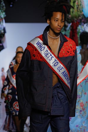 A model in a Who Gets To Be American sash from Prabal Gurung SS20 collection