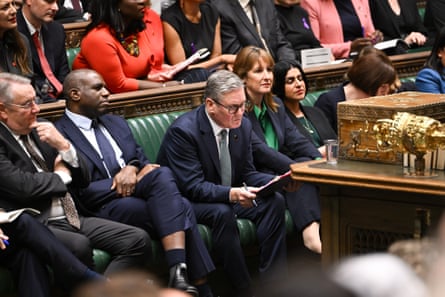 Keir Starmer sat on the green frontbench during Prime Minister's Questions