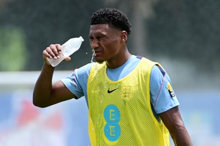 Ollie Watkins splashes his look pinch h2o during training