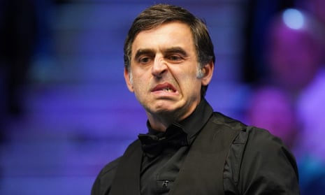 Ronnie O'Sullivan reacts during his match against Ding Junhui at the UK Snooker Championship.