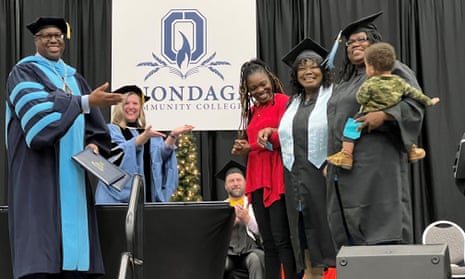 Barbara Wiggins flanked by her daughters Alisha (left) and Tanisha (right) at the Onondaga Community College graduation ceremony.