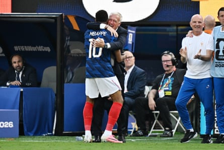 Didier Deschamps is embraced by Kylian Mbappé arsenic France return connected Sweden.