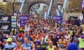 Thousands of runners cross Tower Bridge during the 2023 London Marathon