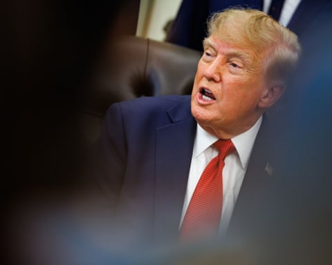 Trump answers questions from reporters in the Oval Office at the White House on 18 September 2026.