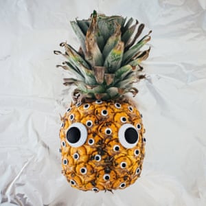 A pineapple with googly eyes