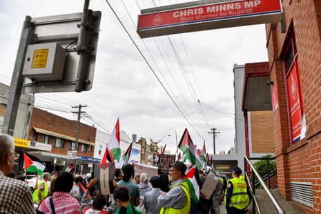 Pro-Palestinian protesters outside Chris Minns’ Sydney electoral office