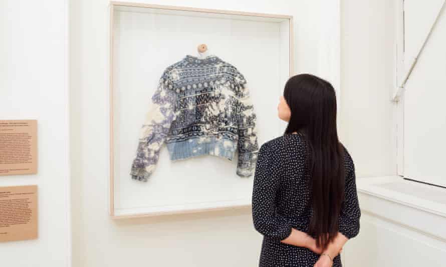 A heavily mended jumper by Celia Pym on show at Somerset House