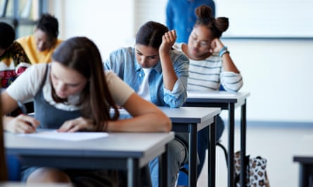 students work on exam