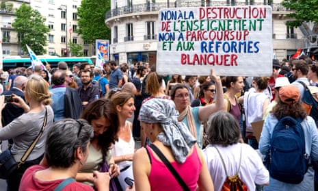 Teachers on strike with a banner reading: “No to the destruction of the education system, to parcoursup [an online system for graduated students applying to universities] and to Blanquer’s reforms” in Paris.
