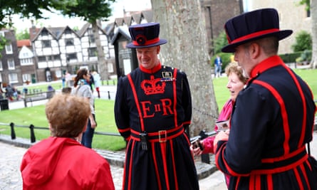 Beefeaters chat to tourists at the Tower of London