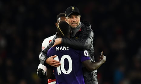 Jurgen Klopp hugs Sadio Mané, who had a goal seemingly wrongly ruled out for offside during  Liverpool’s 1-1 draw at Arsenal