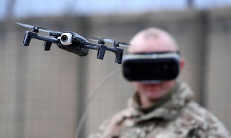  A British army soldier on Salisbury Plain flies a Parrot Anafi drone to demonstrate the latest military technology.